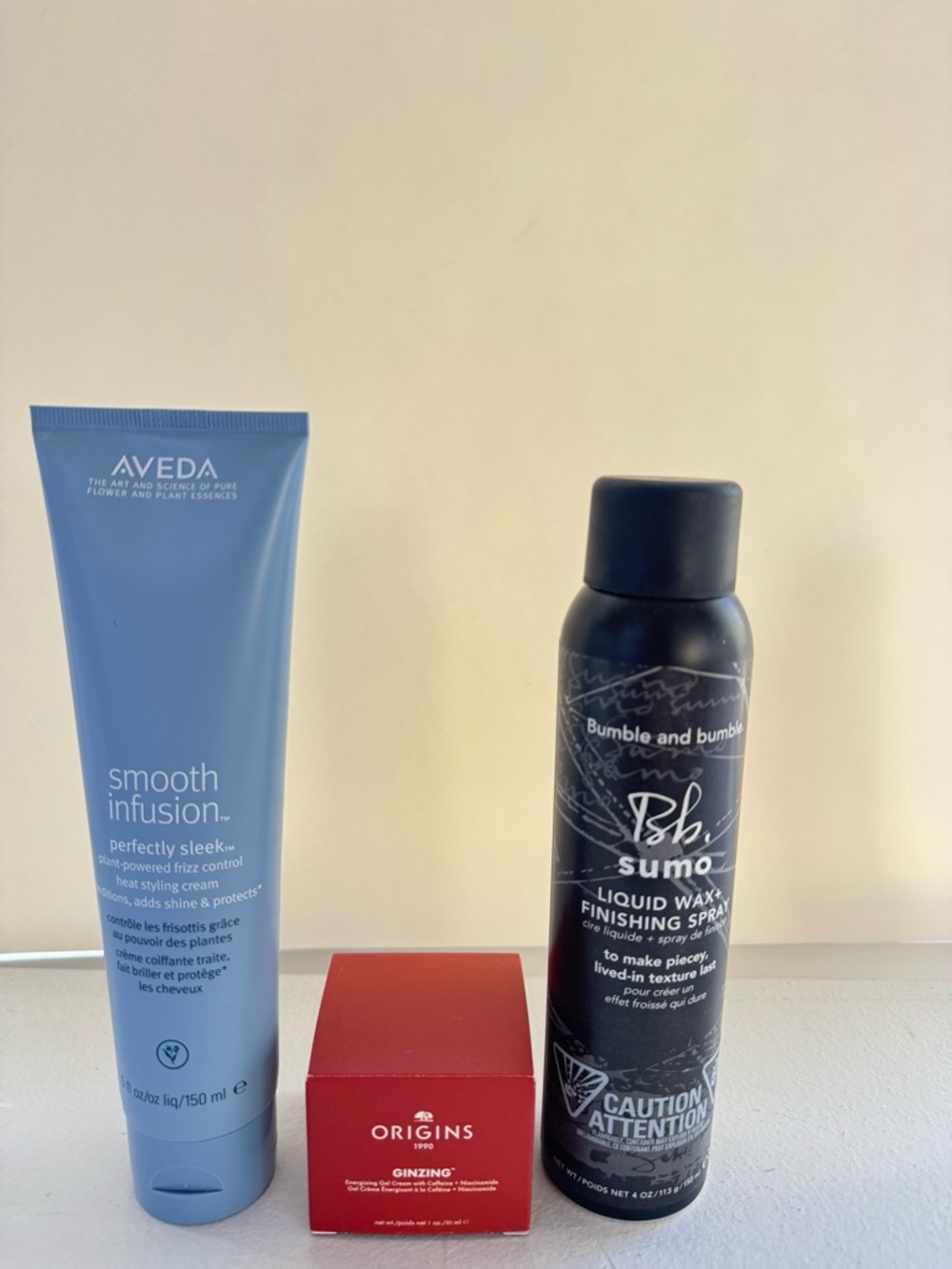 Aveda frizz control and heat styling cream+ Bumble and bumble liquid wax